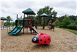 Valentine Hills Park Playground with Ladybug shaped toy