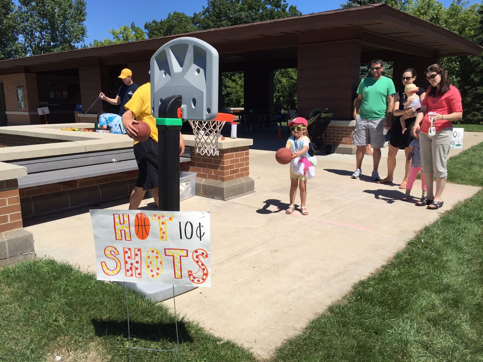Young girl shooting hoops at Penny Carnival